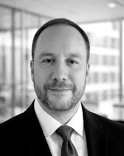 Portrait of Lee Vallender, Director of Devol Legal